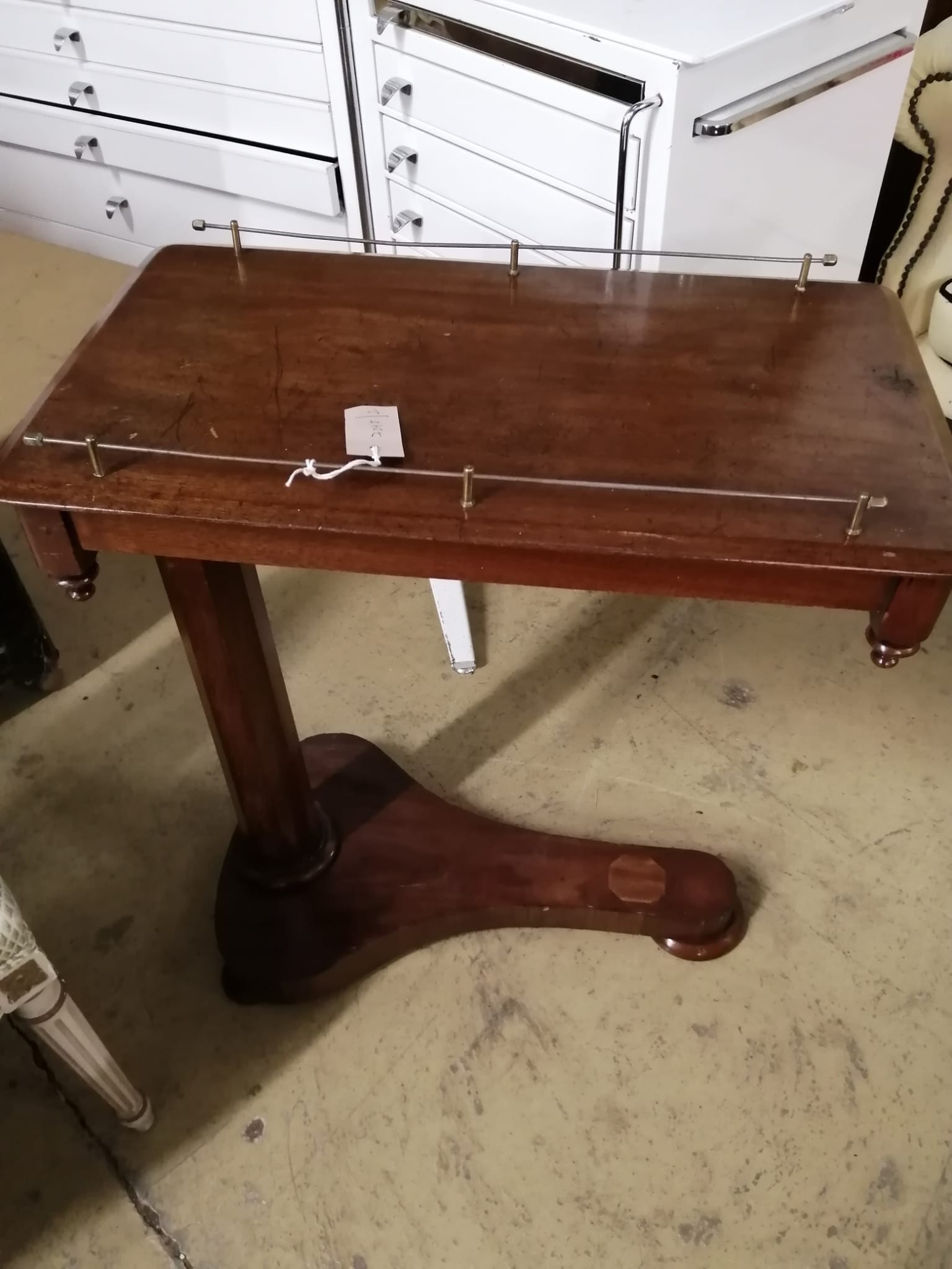 A Victorian mahogany adjustable reading table, width 61cm